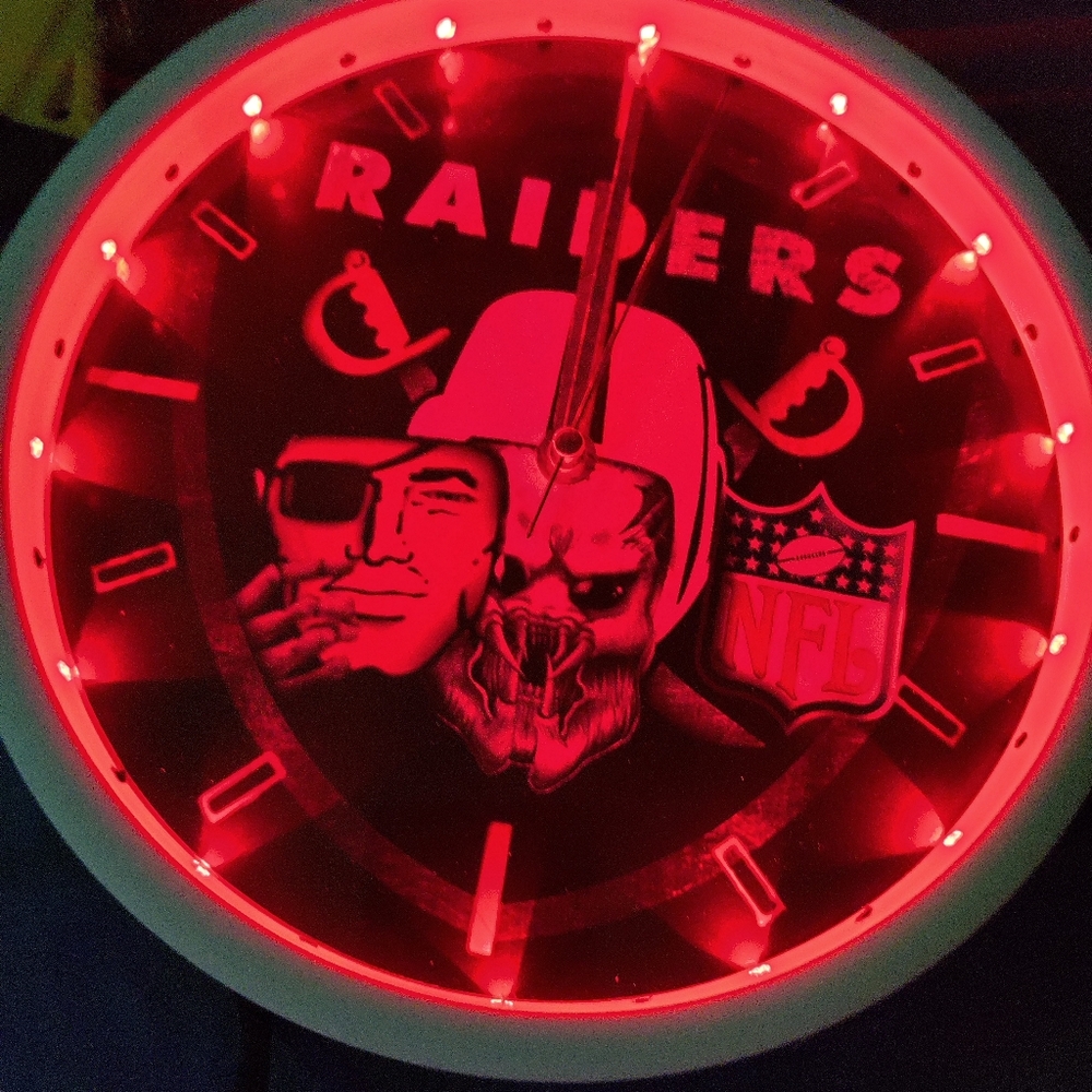 Raiders predator wall clock